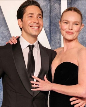 Justin Long with his girlfriend.